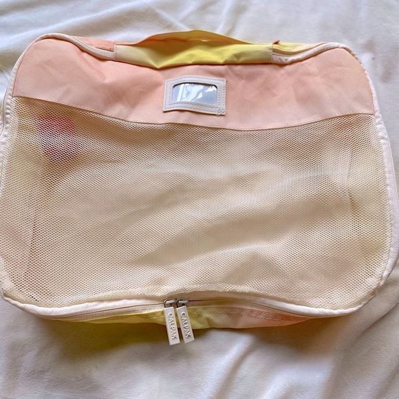 Calpak Handbags - Calpak Peach and Yellow Mesh Travel Bag